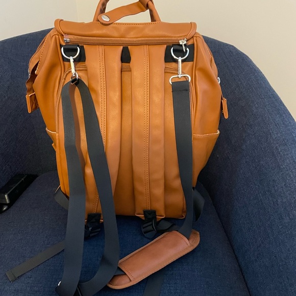 Diaper bag never used. Has soft leatherlook.( man made material) - Picture 3 of 8